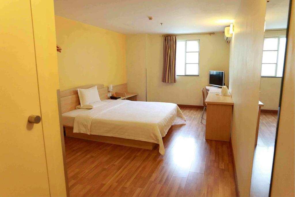 7Days Inn Guangzhou Xinshi Chambre photo