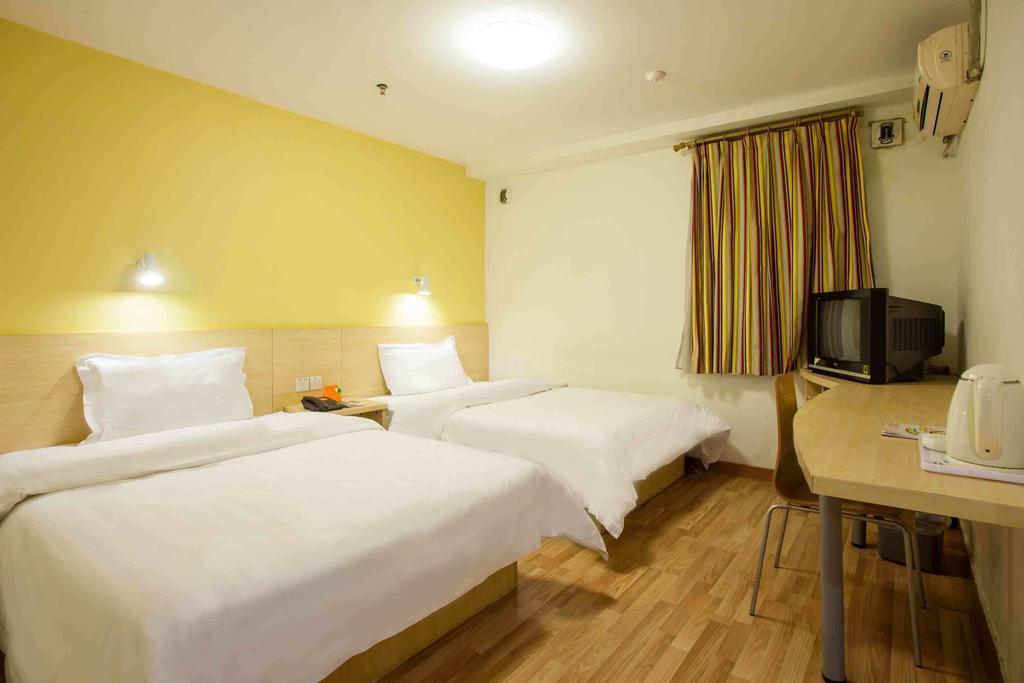 7Days Inn Guangzhou Xinshi Chambre photo