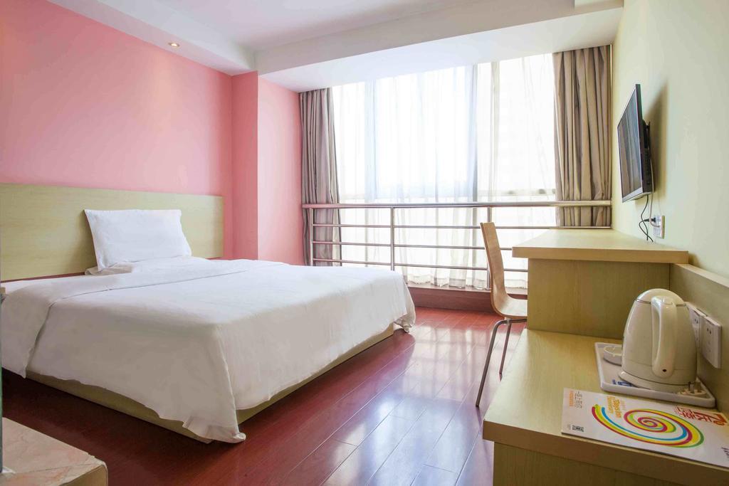 7Days Inn Guangzhou Xinshi Chambre photo